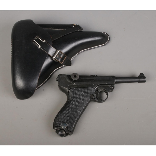 447 - A replica Denix P-08 Parabellum pistol, in reproduction holster, stamped P08, 1941. Pistol stamped 9... 