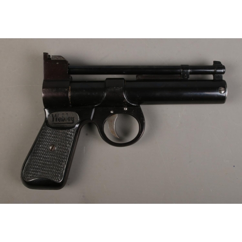 462 - A Webley & Scott The Webley Junior .177 calibre air pistol featuring chequered grips. CANNOT POST OV... 