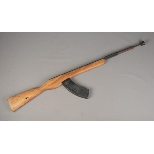 97 - A bayonet training rifle with spring loaded 