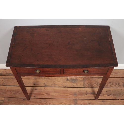 475 - A Georgian Mahogany side table having two short drawers with brass ring pull handles.

Hx75cm
Wx83cm... 