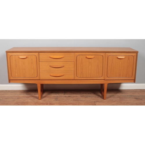 478 - A mid-twentieth century teak sideboard, produced by Stonehill, in the Stateroom design. Height: 73cm... 