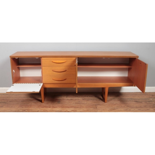 478 - A mid-twentieth century teak sideboard, produced by Stonehill, in the Stateroom design. Height: 73cm... 