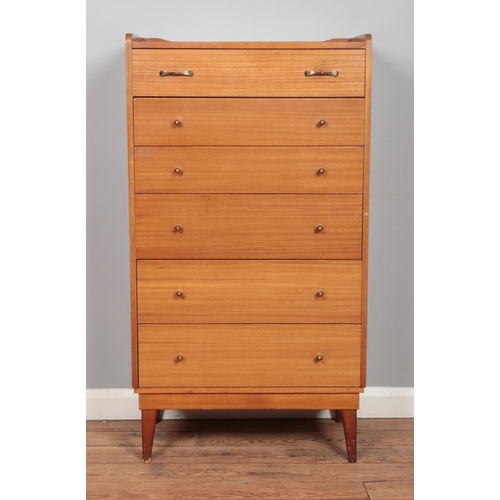 479 - A vintage teak Austinsuite tallboy chest of six drawers. Height: 115cm, Width: 64cm, Depth: 40cm.