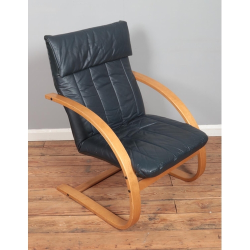 487 - A modern Danish leatherette reclining chair.