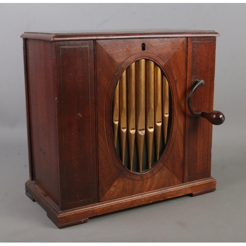 A late 18th/early 19th century mahogany barrel organ. Height 30.5cm.