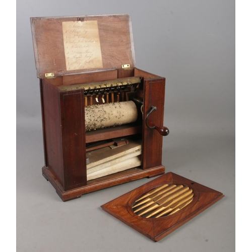 1 - A late 18th/early 19th century mahogany barrel organ. Height 30.5cm.