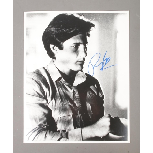 119 - A Richard Gere signed monochrome photograph.