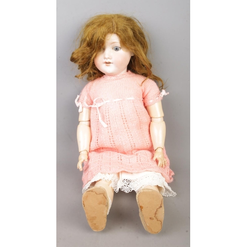 146 - An Armand Marseille bisque head socket doll stamped 390n. A.6½.M. to nape of neck.