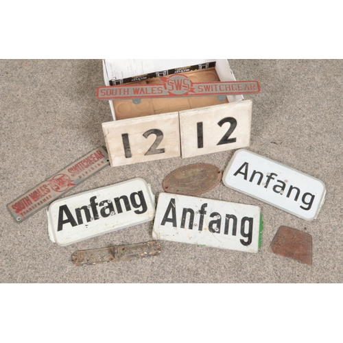 212 - A collection of wood and metal signs. Includes railway markers, Anfang, Hurst Nelson & Co, Hansons D... 