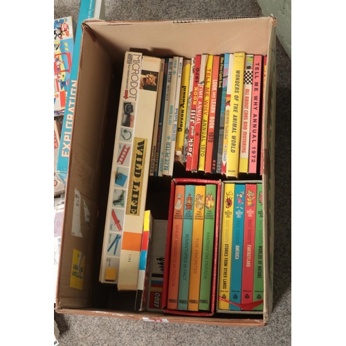 223 - A box of assorted children's toys, games and annuals to include Blue Peter, Lego, Disney Books, etc.... 