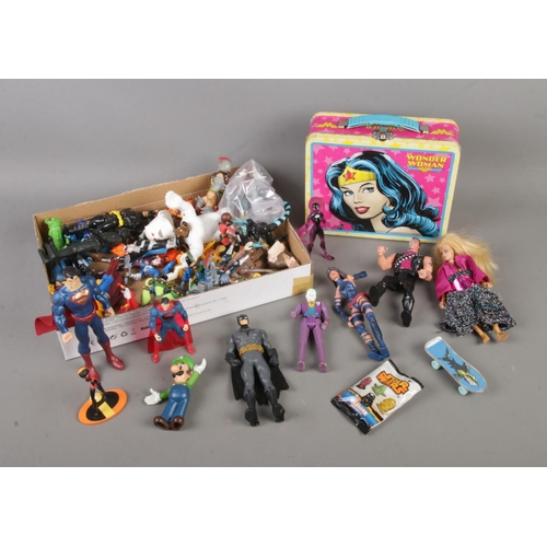 226 - A collection of child's action figures to include Batman, Star Wars, Superman, Marvel, Scooby Doo, D... 