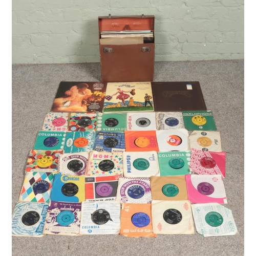 267 - A box and carry case of assorted singles and LP records, mainly 60's and 70's examples. To include S... 