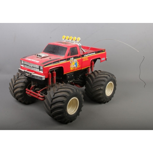 283 - A Tamiya 'Clod Buster' remote controlled monster truck.