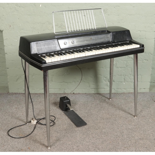 287 - A Wurlitzer 200A Electronic Piano, with foot pedal, volume and vibrato dials. Accompanied by a paino... 