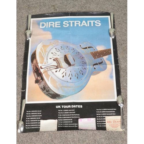 295 - A Dire Straits 'Brothers in Arms' tour poster along with three concert tickets each dated for 1985.