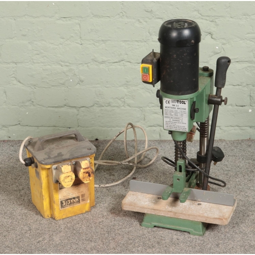 348 - A NuTool NM2-2 Mortising Machine along with Defender 110v Power Tool Transformer.