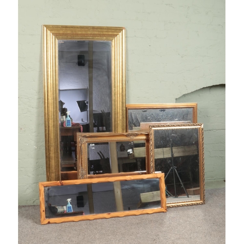 356 - Five assorted mirrors, to include gilt framed and bevel edged examples.