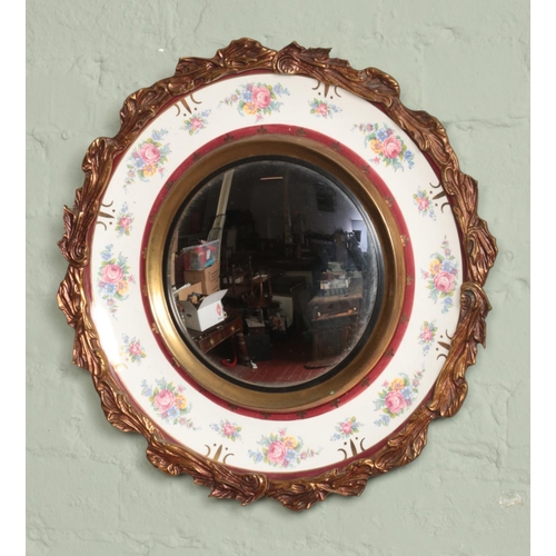 365 - A Burleigh Ware Burgess & Leigh convex wall mirror, with gilt and floral detailing. 49cm diameter.