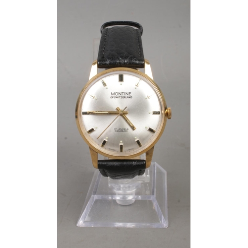 392 - A Gent's manual wind Montine of Switzerland wristwatch on black leather strap. With silvered dial an... 