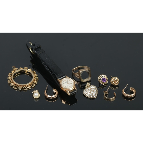 395 - A collection of Gold and yellow metal jewellery, to include 18K Mudu ladies cocktail wristwatch, coi... 