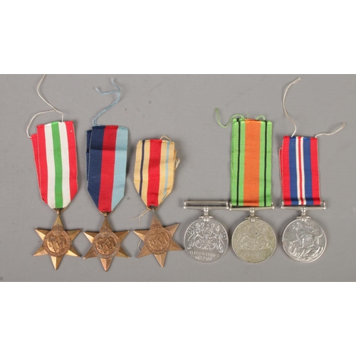 398 - Six WWII medals, including To include 1939-45 medal, two Defence Medals, Africa Star, Italy Star and... 