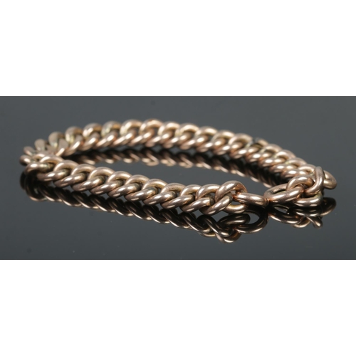 401 - A gold curb link chain, 18cm long. Tests as 9ct. 10.8g