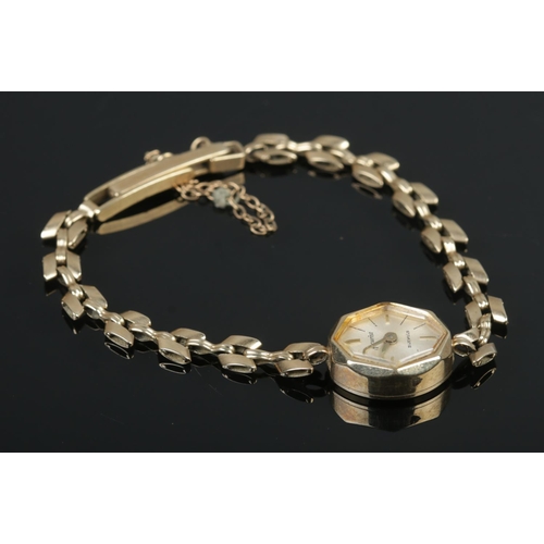 417 - A ladies 9ct Gold Accurist manual wind wristwatch, featuring silvered dial, baton marks and 21 jewel... 