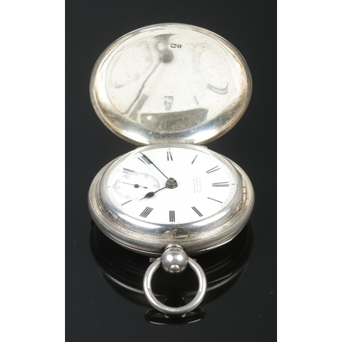 430 - A silver cased full hunter pocket watch, having engine turned case, enamel dial with subsidiary seco... 