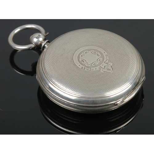 430 - A silver cased full hunter pocket watch, having engine turned case, enamel dial with subsidiary seco... 