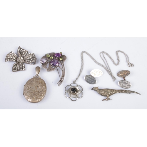 437 - A collection of silver and white metal jewellery. To include boxed cufflinks, silver pheasant brooch... 