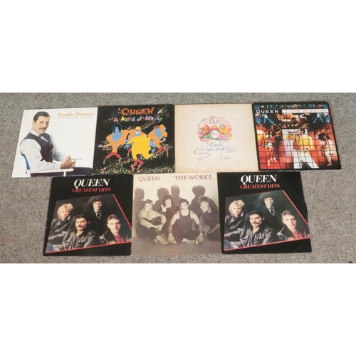 80 - Queen; A collection of seven LP vinyl records, including A Night at the Opera, A Kind of Magic, The ... 