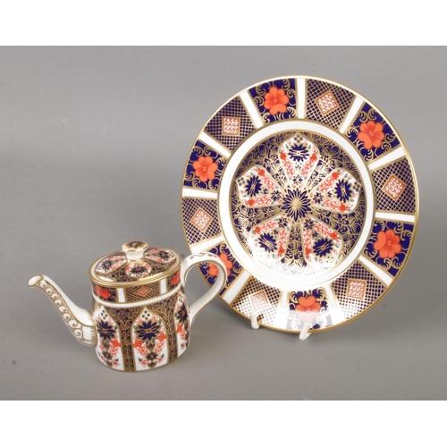 456 - Two pieces of Royal Crown Derby Imari ceramics in the 1128 pattern to include miniature tea pot (dat... 