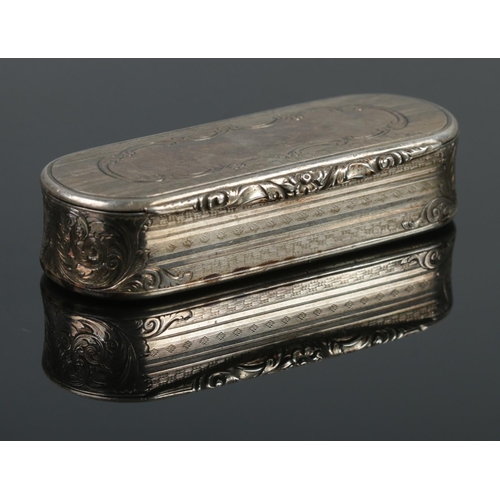 466 - A Victorian silver snuff box of oblong form, with scrolled and engine turned detailing and blank top... 