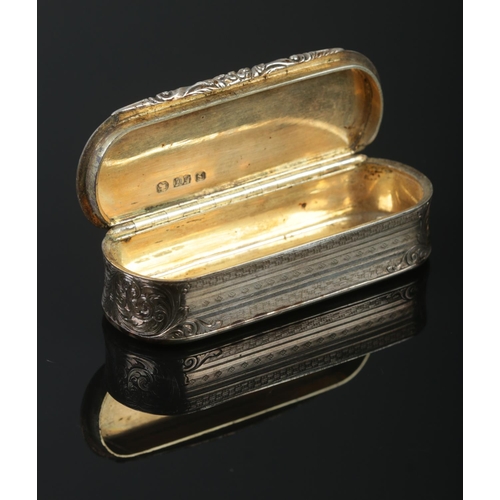 466 - A Victorian silver snuff box of oblong form, with scrolled and engine turned detailing and blank top... 