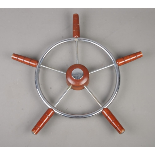 88 - A vintage five-spoke ships wheel. 57cm diameter.