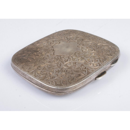 475 - A George V silver hinged cigarette case. With swirl engraving and blank shield to the front. Assayed... 