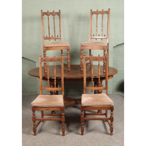 544 - An Ercol extending dining table with set of four Old Colonial Ercol design chairs.

Hx72cm 
Wx164cm ... 