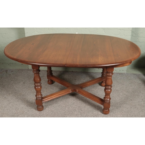 544 - An Ercol extending dining table with set of four Old Colonial Ercol design chairs.

Hx72cm 
Wx164cm ... 