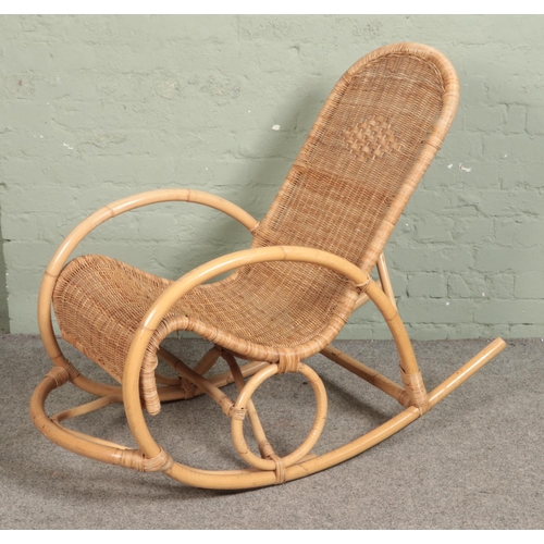 545 - A cane work rocking chair