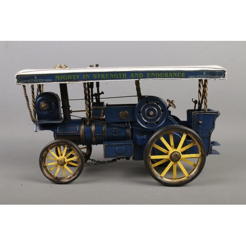 183 - A model steam engine painted in white and blue with motto 'Mighty in Strength and Endurance, length ... 