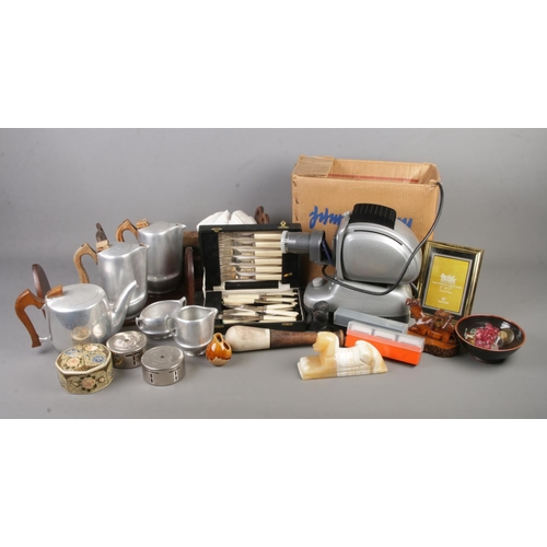 187 - An assorted mix of collectables including a Noris projector, Piquet Ware ands similar teawares, adju... 