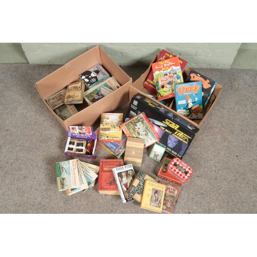 198 - A collection of vintage games, books and other collectables including vintage puzzles, dominoes, tid... 