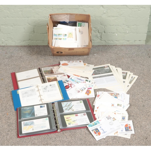 218 - A box containing military first day covers signed and unsigned examples, Great Britain first day cov... 