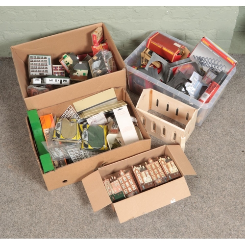 245 - Three large boxes of railway diorama accessories mostly comprising of buildings with some diorama ac... 