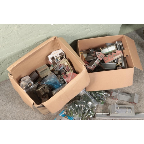 249 - Two large boxes of railway diorama accessories mostly of buildings including, platform buildings, sh... 