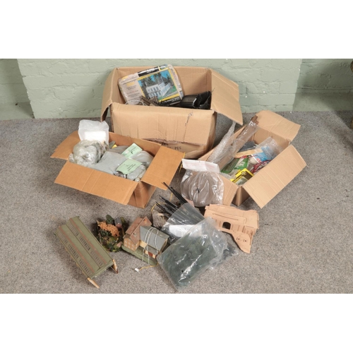 251 - Three large boxes of railway diorama accessories including track, buildings, soil and substrate, tre... 