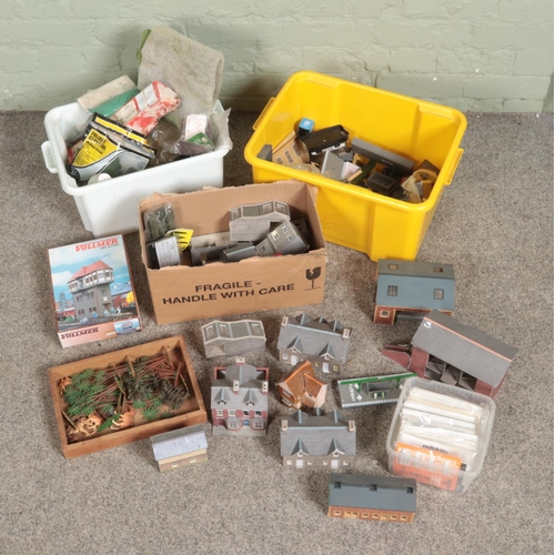 252 - Three boxes of railway diorama accessories including a large quantity of buildings, miniatures anima... 