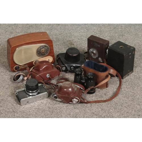 260 - A collection of vintage cameras including Koura, Ricoh and kodak examples with a set of binoculars a... 