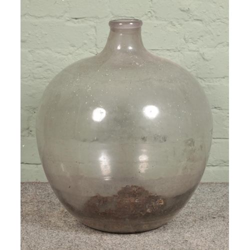 288 - A large glass carboy/demijohn bottle 

Hx54cm approx