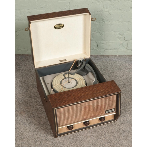 307 - A 1950's original oak cased Dansette record player